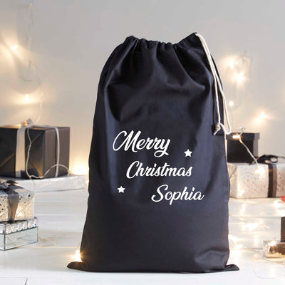 Personalised Merry Christmas Santa sack in black with white stars