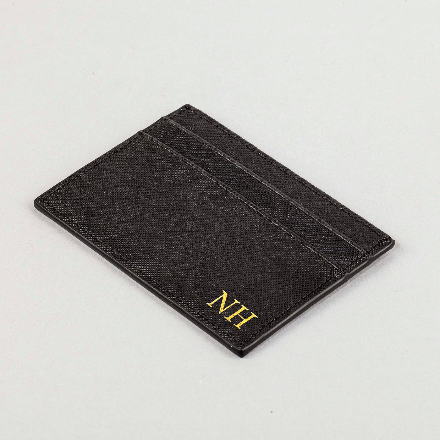 black saffiano leather card holder embossed with initials