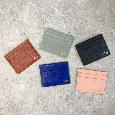 Tan pebble leather card holder embossed with initials also in blue, black, nude and grey