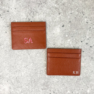 Tan pebble leather card holder embossed with initials