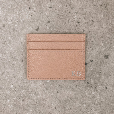Nude pebble leather card holder embossed with initials