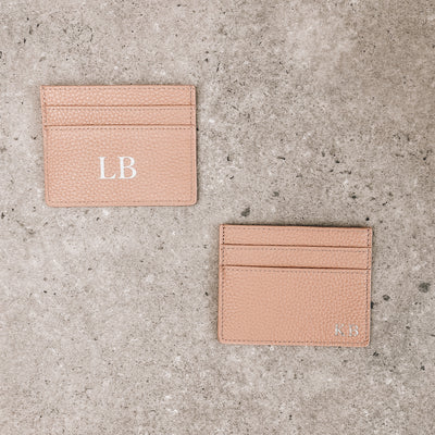 Nude pebble leather card holder embossed with initials and drop shadow initial 