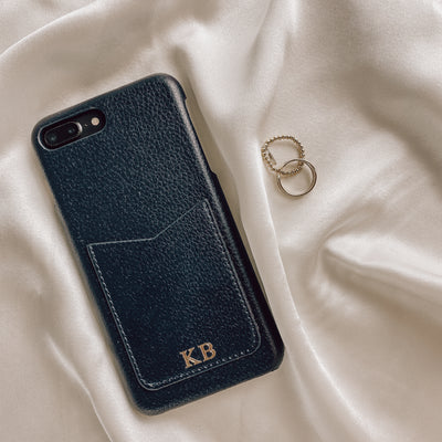 navy pebble leather pocket phone case with gold embossed