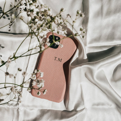 Pink pebble leather phone case with embossed initials 
