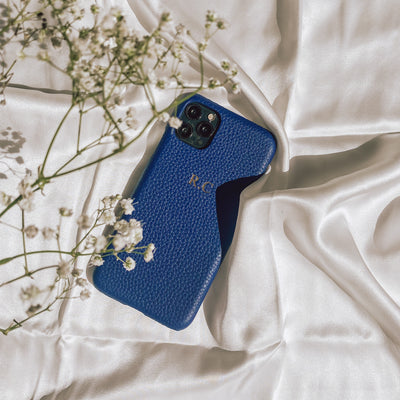 blue pebble leather phone case with embossed initials 