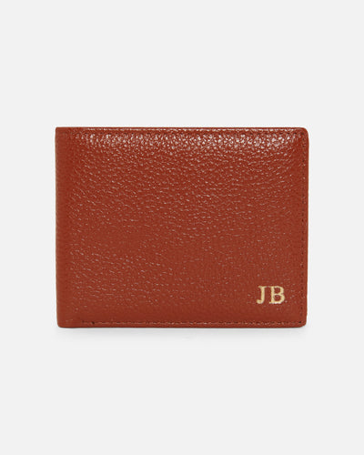 tan pebble leather wallet embossed with gold initials