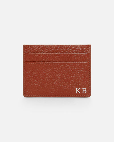 tan pebble leather card holder embossed with initials