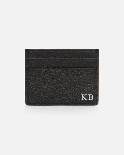 Black pebble leather card holder embossed with initials